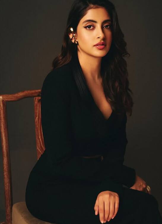 Navya Boss is a lady. Their formal looks are prevalent. She looks very glamorous in this black suit.