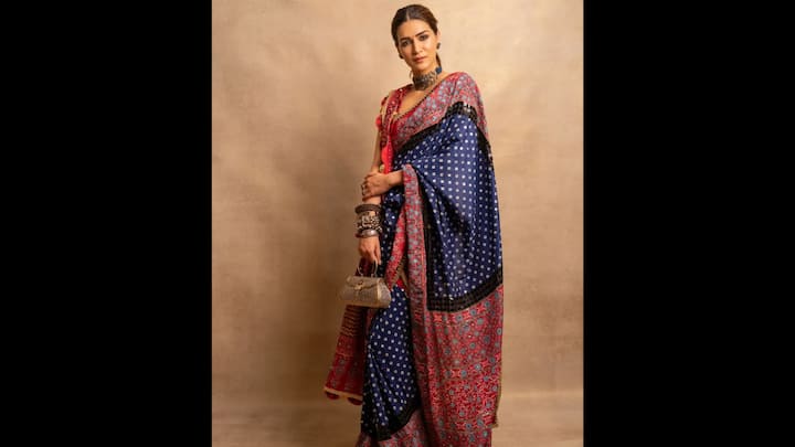 6. Kriti Sanon: Kriti Sanon looked breathtaking in a royal blue and red block print saree. The saree featured intricate hand block motifs in indigo and crimson, paired with a contrasting blouse that highlighted the richness of the craft. Kriti styled the look with a bold oxidised choker, stacked bangles, and a statement clutch. Kriti’s look perfectly balances ethnic tradition with contemporary styling. (Image Source: Instagram/@labelnityabajaj)