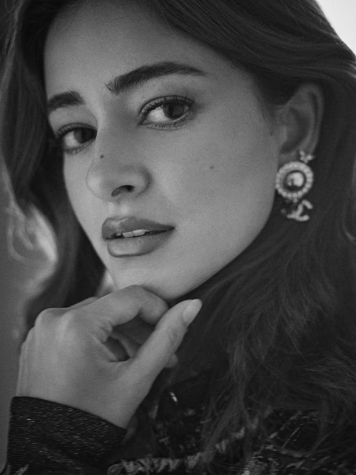 In the close-up shots, Ananya is seen exuding a calm yet captivating aura. Her makeup is kept minimal, with softly defined brows, a hint of kohl to accentuate her expressive eyes, and a muted lip shade that balances the overall look.