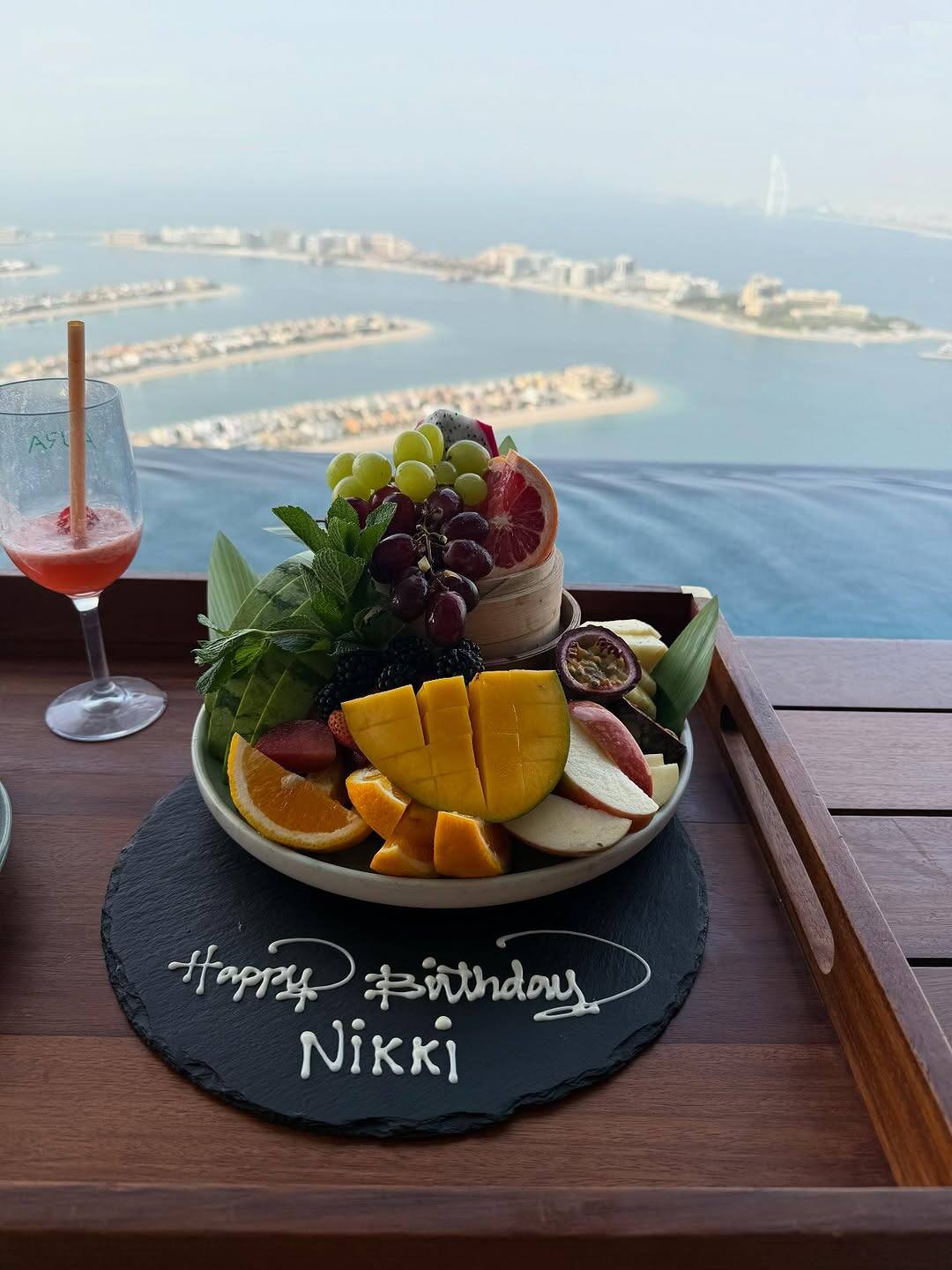 Along with this, he has also shared another photo in which fruits like cake are also decorated in a plate. Happy birthday Nikki is written in it, congratulating the actress on his birthday.
