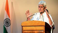 जम्मू-कश्मीर के LG ने 2 सरकारी कर्मी को नौकरी से निकाला, आतंकी संगठन से जुड़े हैं तार