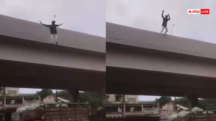 Video: पुल से गाड़ी पर कूदना चाहता था शख्स, सीधा नीचे गिरा, भारी पड़ा स्टंट, वीडियो वायरल Video: पुल से गाड़ी पर कूदना चाहता था शख्स, सीधा नीचे गिरा, भारी पड़ा स्टंट, वीडियो वायरल