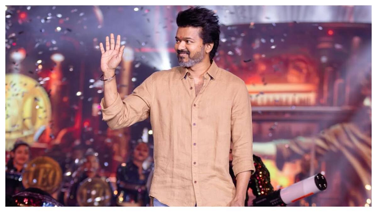 Vijay Fan Risks Life Hanging Off Railing To Give Him A Book In Madurai. Watch Video