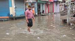 भारी बारिश के बाद जलमग्न हुई वाराणसी, सड़कें बनीं तालाब, तस्वीरों में देखें काशी का मंजर
