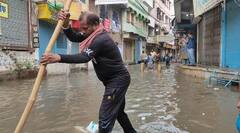 भारी बारिश के बाद जलमग्न हुई वाराणसी, सड़कें बनीं तालाब, तस्वीरों में देखें काशी का मंजर