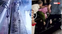 Video: प्लेटफॉर्म से नीचे गिरी महिला, चलती ट्रेन के नीचे फंसी, वीडियो देख हैरान रह जाएंगे आप