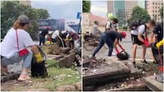 Video Of Foreign Nationals Cleaning Drains In Gurugram Goes Viral, Congress Says 'Shameful'