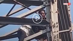 Video: 'पति को बुलाओ, धोखा दे रहा है', हाईटेंशन टावर पर चढ़ महिला ने किया ड्रामा, वीडियो वायरल