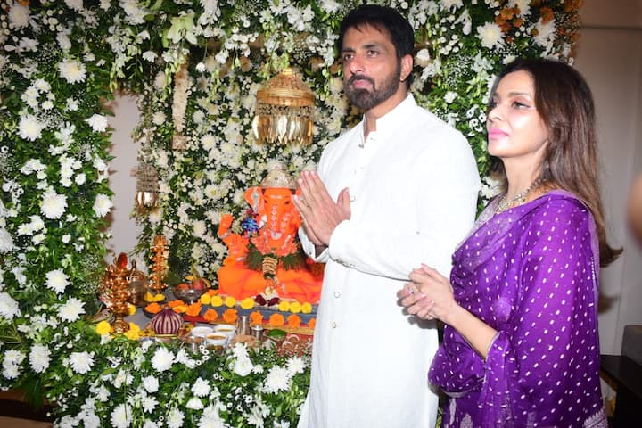 Sonu Sood is wearing a white traditional kurta pajama, which looks perfect for the festival. His wife has carried a purple color suit, on which there is a detailing of silver print.