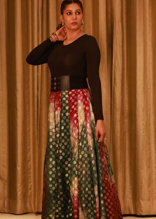 Sapna Chaudhary looks quite captivating in a multicolor skirt with black full sleeves top. From above, his killer plays are enough to injured the fans.