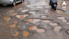 উত্তর থেকে দক্ষিণ, বর্ষার জল জমে বেহাল রাস্তা, ছড়িয়ে খোয়া পাথর! প্রাণ হাতে করেই চলছে যাতায়াত