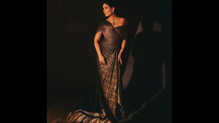 7. Kareena Kapoor: Kareena stunned in a custom pre-owned vintage Banarasi saree. The look was created by restoring aged Banarasi textiles using meticulous pleating and modern restoration techniques, giving the six-yard drape a contemporary sculptural appeal. What makes this look iconic is the fusion of tradition with innovation. (Image Source: Instagram/@rheakapoor)