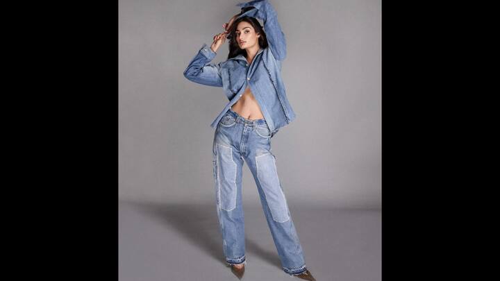 4. Athiya Shetty: Denim on denim has always been a bold fashion choice. Athiya Shetty proves just how effortlessly chic it can look. Her casual yet edgy outfit features a two-tone denim shirt styled with patchwork wide-leg jeans, creating a modern twist on the classic Canadian tuxedo. The slightly unbuttoned shirt adds a touch of laid-back glam, while pointed-toe heels elevate the ensemble. The relaxed denim fit keeps it wearable, while the statement patchwork and styling give it runway vibes. (Image Source: Instagram/@athiyashetty)