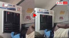 क्या प्रो मैक्स बंदा है... ट्रेन में कूलर लेकर ही पहुंच गया शख्स, ऊपर वाली बर्थ पर ठंडी-ठंडी हवा में सोता मिला; वीडियो वायरल