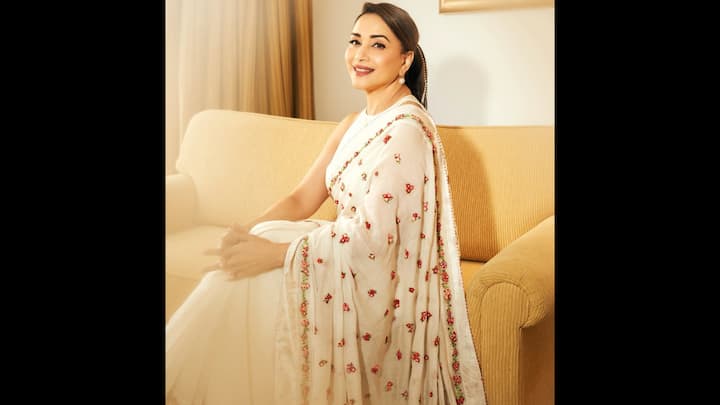 5. Madhuri Dixit: Madhuri Dixit once again proved why she is the eternal queen of elegance. Adorned with dainty floral embroidery in soft pinks, red, and greens, her saree beautifully balanced simplicity with subtle detailing. The delicate floral work gave the ensemble a refreshing springtime vibe. Madhuri’s look is the perfect example of how a white saree can feel both traditional and contemporary. (Image Source: Instagram/@madhuridixitnene)