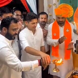 सत्यजीत तांबे आणि अमोल खताळ या दोन्ही आमदारांनी हाताला हात लावून केलेल्या आरतीने अनेकांच्या भुवया उंचावल्या आहेत.