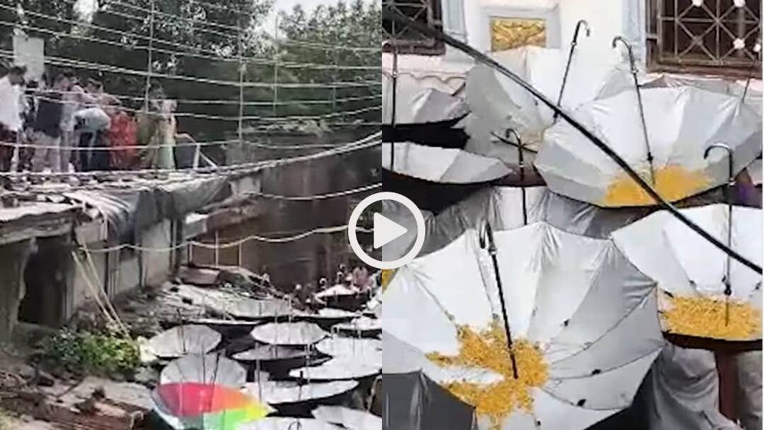 Watch Ganpati temple of Beed of Maharashtra Prasad is not given in hands but is thrown from roof of temple Viral Video Video: श्रद्धा या जुगाड़? फेंका प्रसाद उल्टे छाते में लेते हैं यहां के लोग, गणेश पूजा का वीडियो वायरल