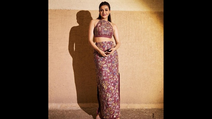 5. Kajal Aggarwal: Kajal Aggarwal proves that ethnic co-ords can be the ultimate festive fashion statement. She stunned in a maroon embellished halter-neck crop top paired with a matching high-waist skirt featuring intricate floral embroidery. The vibrant detailing with sequins and beads added just the right amount of sparkle. If you’re looking for an outfit that blends traditional artistry with contemporary cuts, Kajal’s co-ord set is the inspiration you need this festive season. (Image Source: Pinterest/premnathpk)