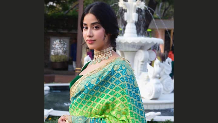 Green Bandhej Saree: Janhvi chose this vibrant green handloom bandhej saree detailed with a golden border. The shades of green and blue added a festive charm to the ensemble. (Image Source: Instagram/ janhvikapoor)
