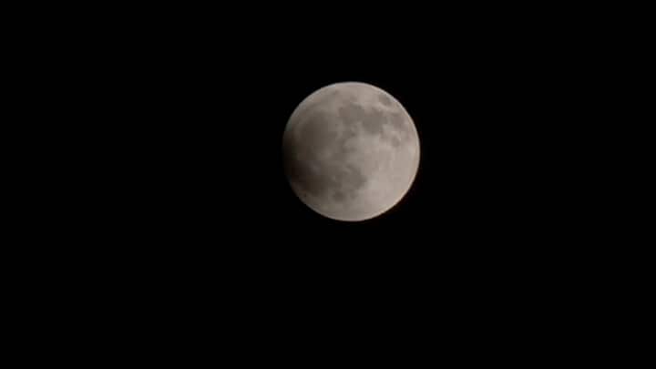 The partial phase of the Total Lunar Eclipse as seen in Chennai, Tamil Nadu. (ANI Photo)