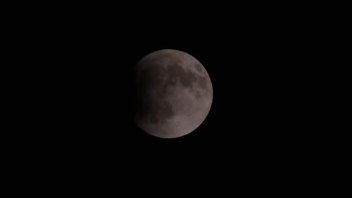 The partial phase of the Total Lunar Eclipse as seen in Jaipur, Rajasthan. (ANI Photo)
