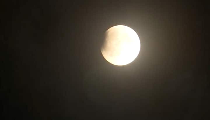 The eclipse seen in the night sky of Guwahati, Assam. (ANI Photo)