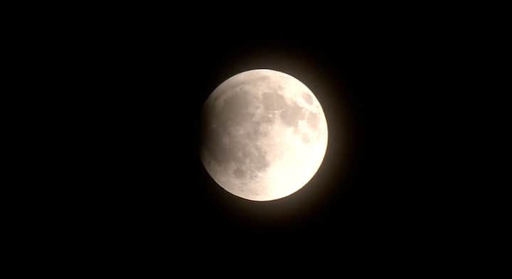 The partial phase of the lunar eclipse as seen in Delhi. (IANS Photo)