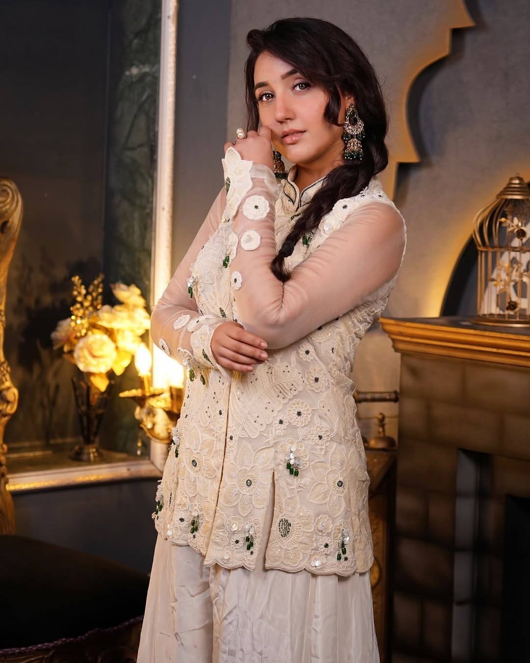 In this white color dress, you can attract the attention of all of you. The actress has carried short kurti with white color skirt style plazo which will show you different from the crowd in the festive season. You can carry contrasting jewelery with such outfits.