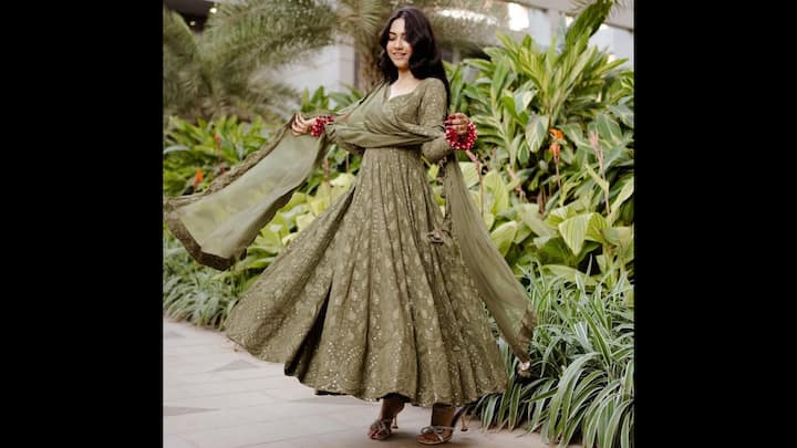 7. ⁠Flowing Green Anarkali: Stepping out in a breathtaking ensemble, Reem Shaikh redefines festive fashion with this stunning outfit. What makes this look stand out is its effortless chic appeal. The rich colour palette of the ensemble adds a touch of regal charm. Perfect for a sangeet, pre-wedding function, or any celebratory occasion, this look is a masterclass in blending traditional elegance with modern sophistication. (Image Source: Instagram/@reem_sameer8)