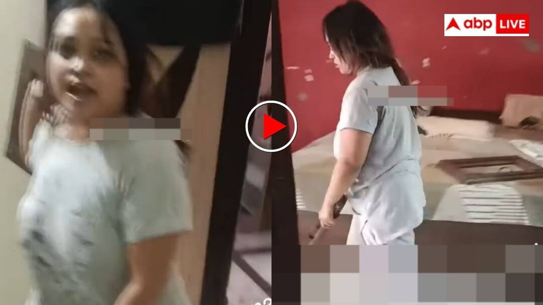 Husband took the wife phone the wife attacked him by throwing glass window video goes viral पति ने चेक करने कि लिए मांगा था फोन, पत्नी ने उठाकर दे मारी पूरी खिड़की- वीडियो हो रहा वायरल