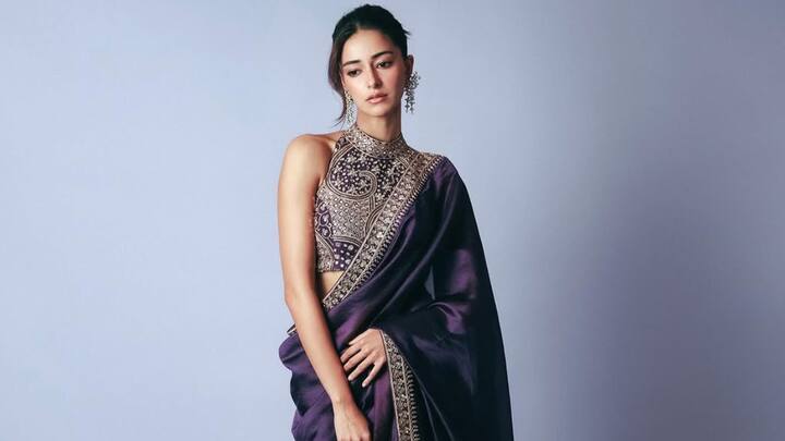 Day 9 – Purple: This regal purple saree with a golden zari border and ornate halter-neck blouse makes Ananya a true desi diva. The backless tie detailing adds just the right amount of glamour to end the festivities in style. (Image Source: Instagram/ ananyapanday)
