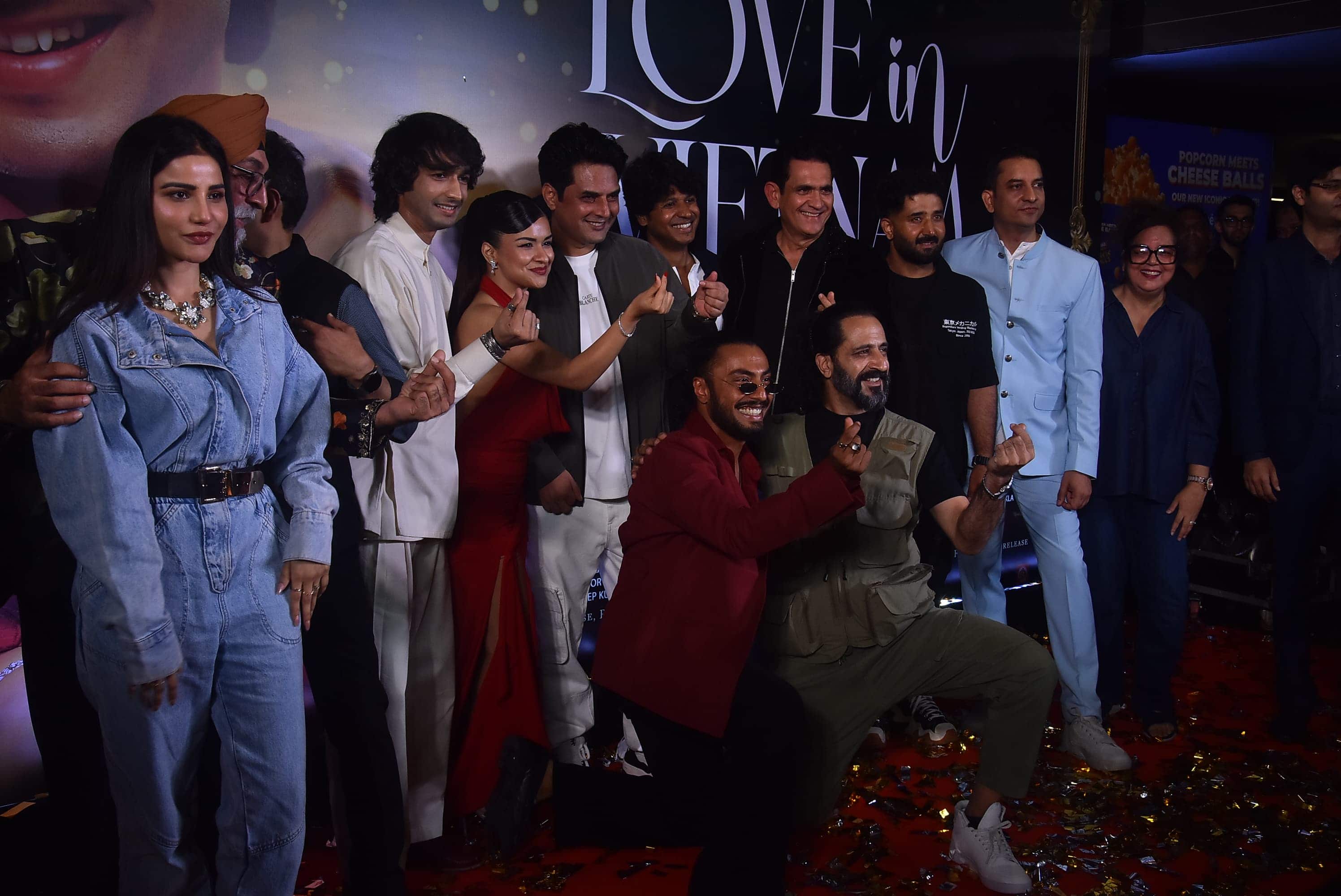 The entire team reached the screening of the film 'Love in Vietnam'. Everyone also gave many poses to Paparaji together.