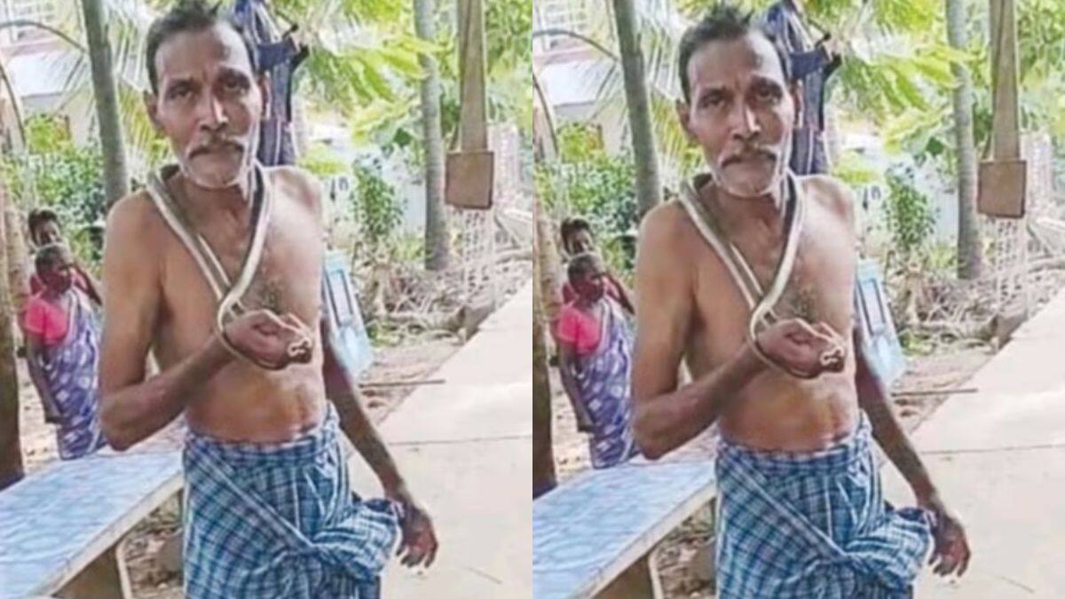 Konaseema News: నన్నే కరుస్తావా అంటూ తాచు పామును మెడలో వేసుకుని మందుబాబు హల్చల్.. సీన్ క‌ట్ చేస్తే...