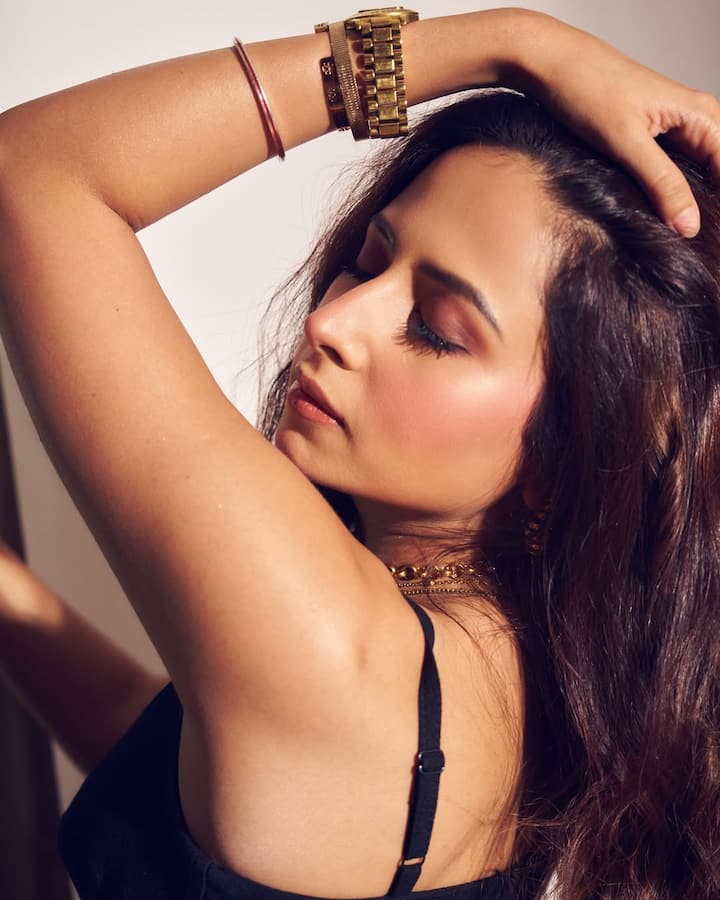 Sargun Mehta Slays The Boss Lady Look In Chic All-Black Ensemble; PICS The sleek black strappy top added a subtle hint of glamour, balancing femininity with power dressing, while the high-waisted, tailored trousers gave the entire look a structured, authoritative vibe.