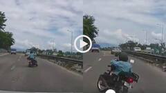 Video: सड़क पर एक गड्ढे ने बिगाड़ा ऐसा बैलेंस, औंधे मुंह जा गिरा बाइकर, हादसे का वीडियो वायरल