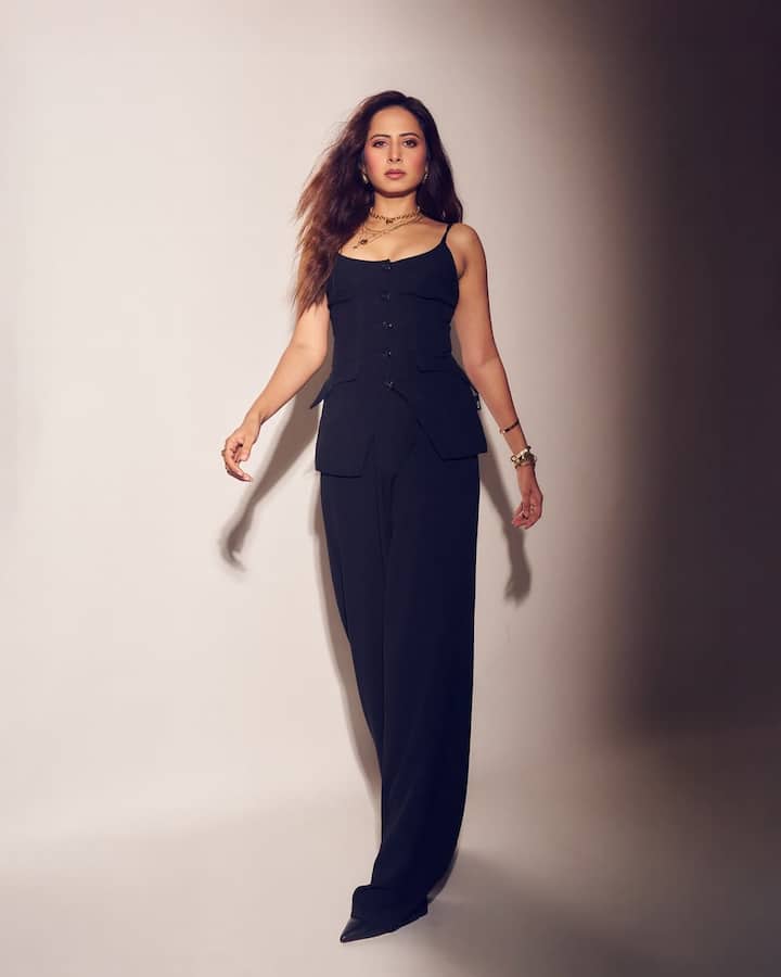 Sargun Mehta Slays The Boss Lady Look In Chic All-Black Ensemble; PICS The actor-producer, known for her sophisticated yet experimental style choices, was recently seen rocking a black strappy top paired effortlessly with matching trousers.