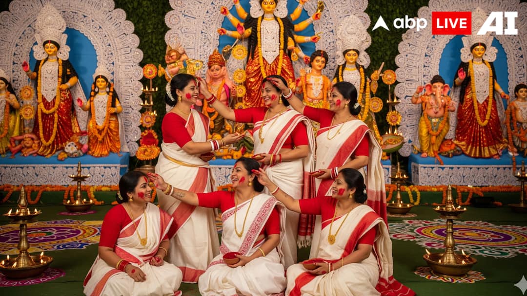 durga-puja-2025-bengali-women-laal-paad-shada-saree-significance Durga Puja 2025: Significance Of The Laal Paad Shada Saree In Bengali Rituals