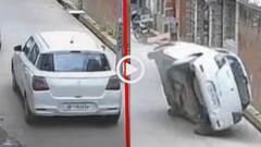 Video: कार है या खिलौना! गली में खड़ी गाड़ी से हुई हल्की टक्कर, पलट गई Swift, वीडियो वायरल