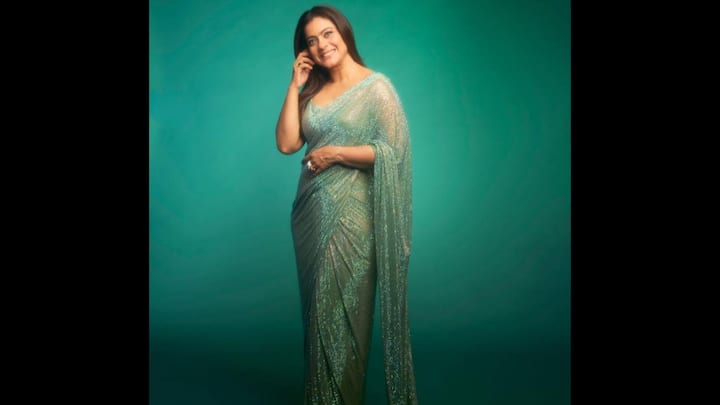 6. ⁠Shimmery Green Saree: Kajol’s dazzling green saree is the ultimate pick if you want to shine bright this Durga Puja. The shimmering sequin detailing adds a glamorous edge, while the elegant drape keeps the look graceful and traditional. Paired with a matching blouse and minimal accessories, this ensemble strikes the perfect balance between festive sparkle and sophistication. (Image Source: Instagram/@kajol)