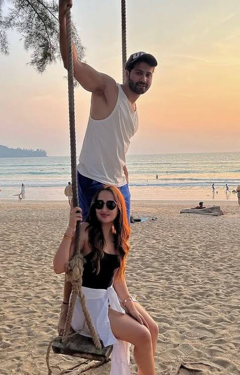 This picture looks of a trip in which Varun and Natasha are seen having fun sitting on the swing. At the same time, there is a lot of stunning in Natasha Beach Look.
