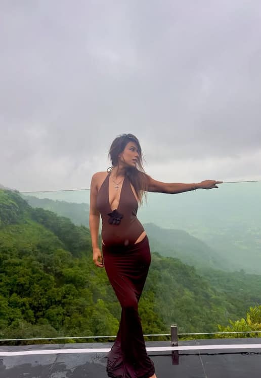 Nia is wreaking havoc in this brown jumpsuit. Their killers are making sensation and waving slaves.