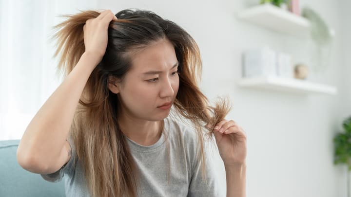 Overlooking Protection from Pollution: Dust, smoke, and festive pollution can weaken strands and cause cuticle damage. Use natural protective hair mists with methi as a key ingredient to moisturize hair shafts, seal cuticles, and guard against external stressors. (image Source: Canva)