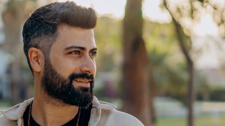 Forgetting Beard Care: It’s not just your crown; your beard deserves festive grooming too. Use post-wash balms with argan, castor, and almond oils to restore luster and strength to beard hair while keeping it soft and manageable. (image Source: Canva)