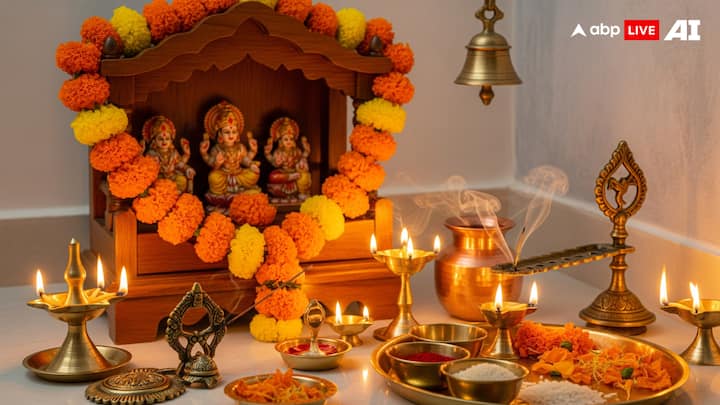 Use of Traditional Accessories: Accessories bring life to the pooja corner. Brass or copper diyas, bells, small water pots, and incense holders are some of the most commonly used items. Aarti thalis with small bowls for kumkum, rice, and flowers can also be easily placed here. And if you like, you can hang a small bell above the mandir, therefore adding a soothing sound to the whole space. (Image Source: ABP LIVE AI)