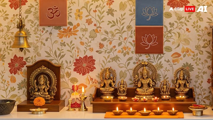Decorative Backdrop or Wall: The wall behind the mandir can be decorated in a very simple way. You can use light-coloured paint, small wallpaper with floral or traditional designs, or even a fabric cloth backdrop. Some people also put tiles with religious motifs behind the pooja unit. A plain and neat wall also works well if you prefer simplicity. (Image Source: ABP LIVE AI)