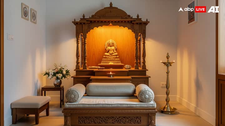 Low Seating for Comfort: In many homes, people prefer to sit on the floor while praying. For this, you can keep a low wooden chowki, a small bench, or even a simple floor cushion. As a result, this makes the place comfortable and allows you to spend more time in prayer. If you have elderly family members, you can keep a low stool or chair for their easy seating.  (Image Source: ABP LIVE AI)