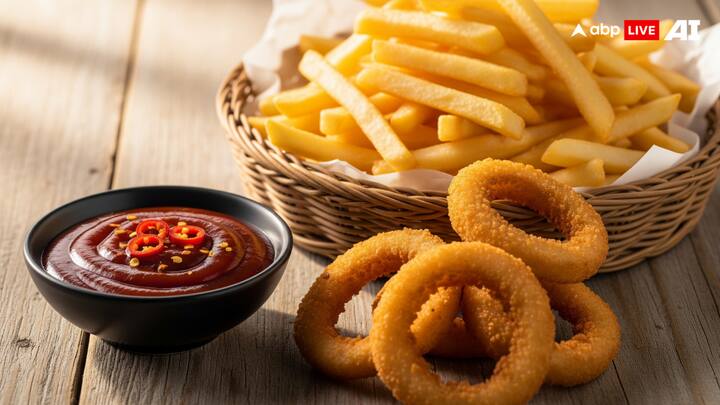 Spicy Barbeque Sauce + French fries or Onion Rings: Few foods are as beloved by all as crispy French fries or crunchy onion rings. Their golden, salty bite makes them the perfect foundation for delicious dips. When you pair them with Spicy Barbeque Sauce, the whole experience is enhanced. The sauce counterbalances the greasy fried food with smoky undertones, a hint of sweetness, and a burst of heat. This combination ensures comfort with a burst of flavor, whether you're entertaining or just indulging for a little treat. (Image Source: ABP LIVE AI)