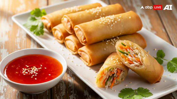 Sweet Chilli Sauce + Spring Rolls: Loved for their crunchy, golden outside and savory vegetable inside, spring rolls have become a party season mainstay. The treat is the perfect fusion of flavors and textures when served with Sweet Chilli Sauce; the crunch and savory of the rolls are balanced by the sauce's subtle sweetness and subtle chilli warmth. The entire dish is exciting yet light, making it a hit with both family and guests. (Image Source: ABP LIVE AI)