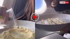 फ्लाइट में बैठ महिला ने बनाया पास्ता! वीडियो देख यूजर्स बोले, वो स्त्री है कुछ भी कर सकती है