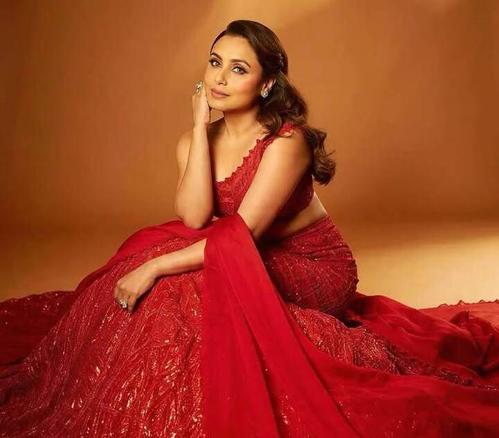 In this picture, Rani is seen in red color lehenga. By carrying nude makeup and simple accessories, she made this look even more modern and stylish.